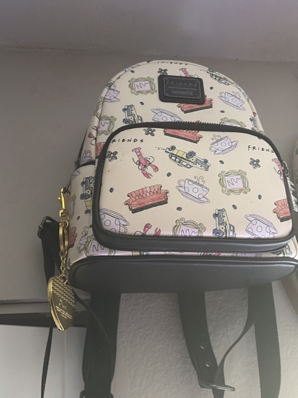 Loungefly Cream Friends Pattern Mini Backpack with Pastel Icons